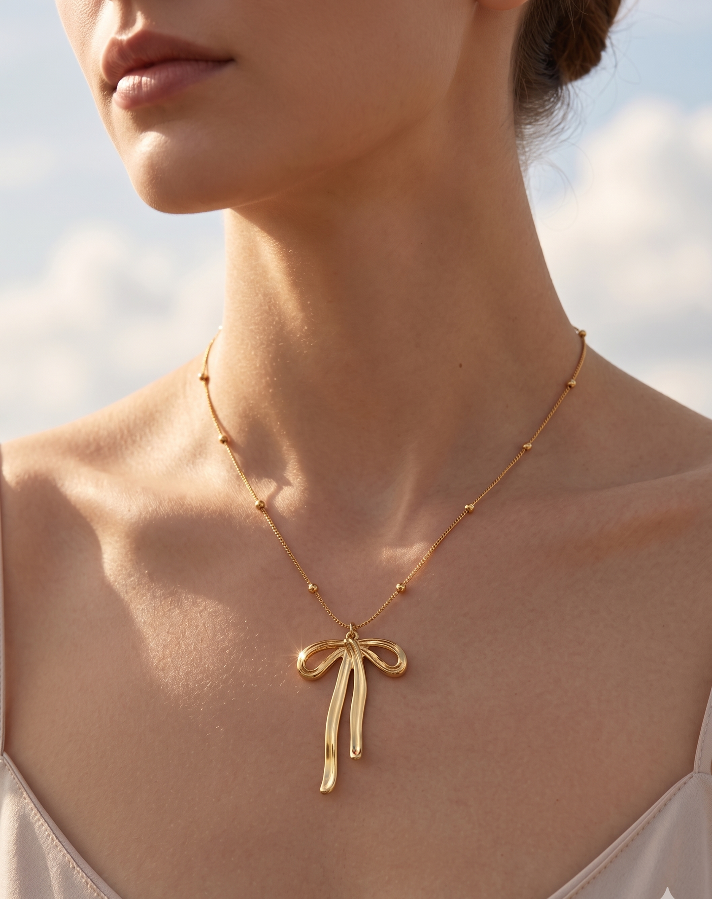 The Vivienne Flowing Ribbon Pendant