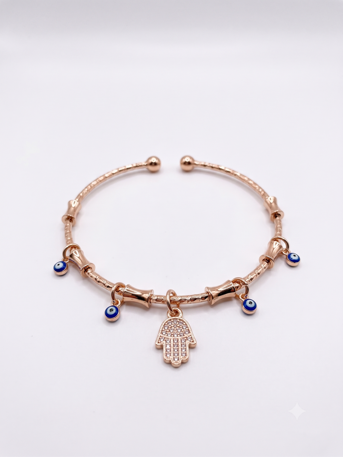 The Pavé Hamsa & Evil Eye Charm Cuff