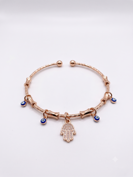 The Pavé Hamsa & Evil Eye Charm Cuff